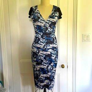 BodyCon print dress by Zara. Lightweight, with exposed back zip detail.